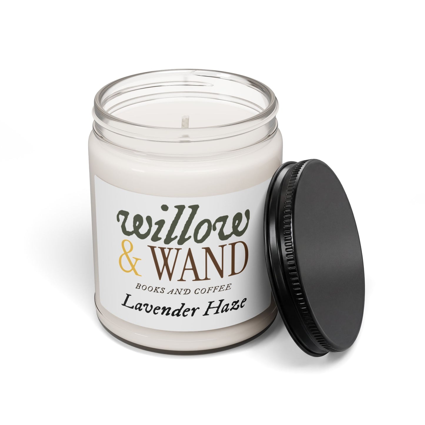 Candle in a glass jar with 'willow & wand' label on a white background