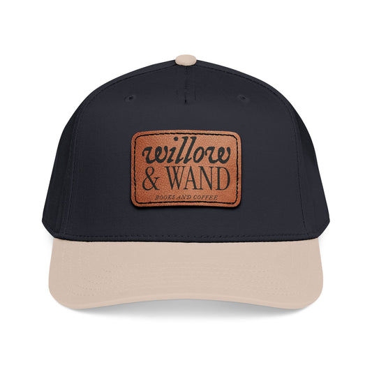 Black and beige cap with a patch on a white background